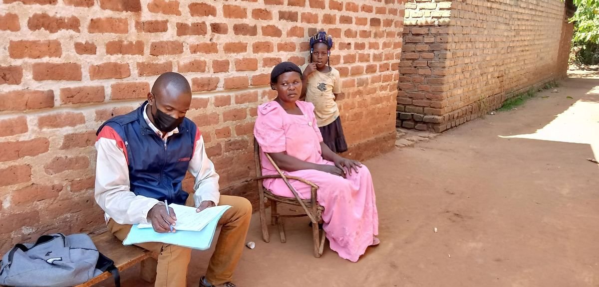 A counsellor taking notes during a private session